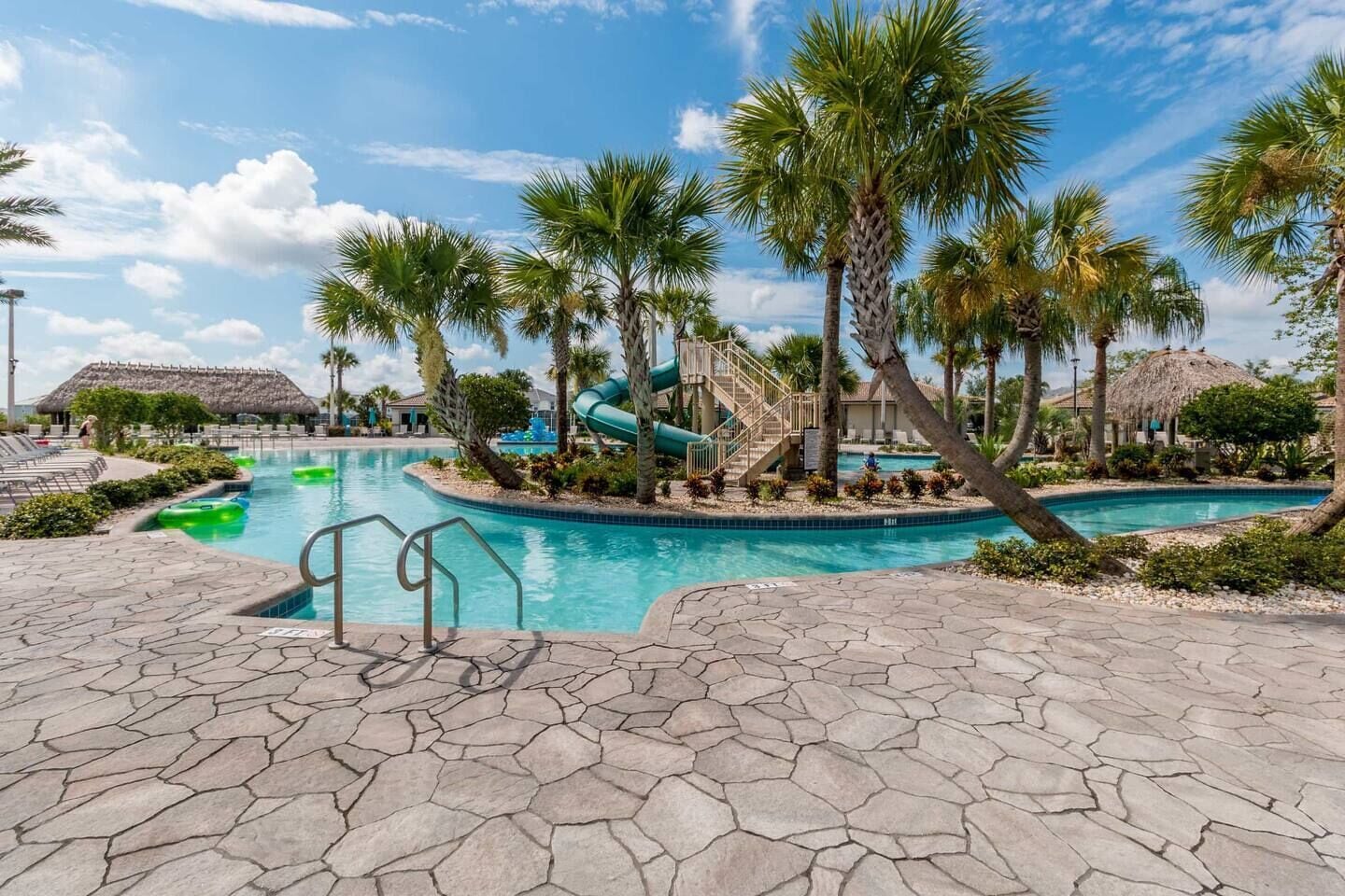 Champions Gate Resort lagoon pool and water slides included with Champions Getaway rental