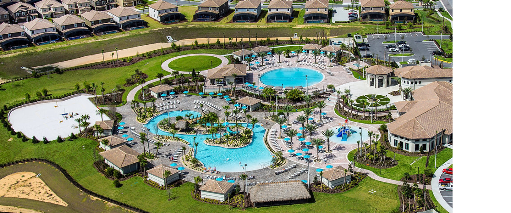 Oasis Club aerial — lagoon pools and resort complex